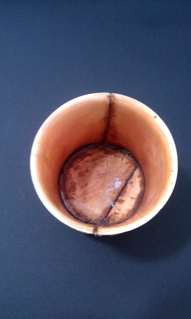 Carved ivory cup – aerial view damaged